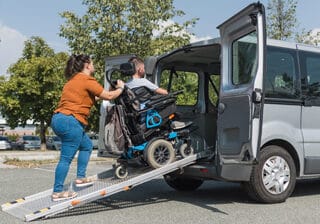 Wheelchair accessible van with ramp for safe, reliable patient transport.